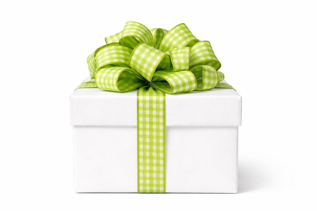 Witte cadeau doos met groene strik.webp